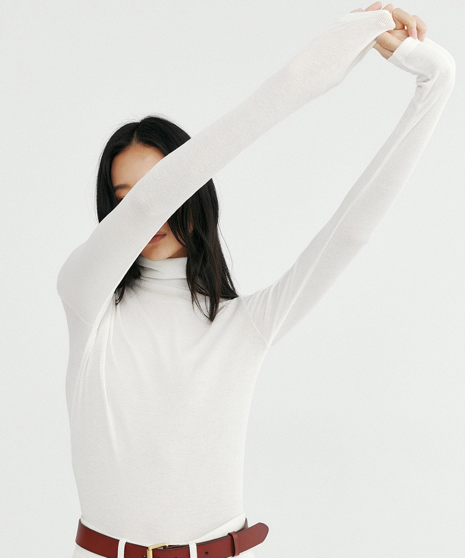 タートルネックリブトップス