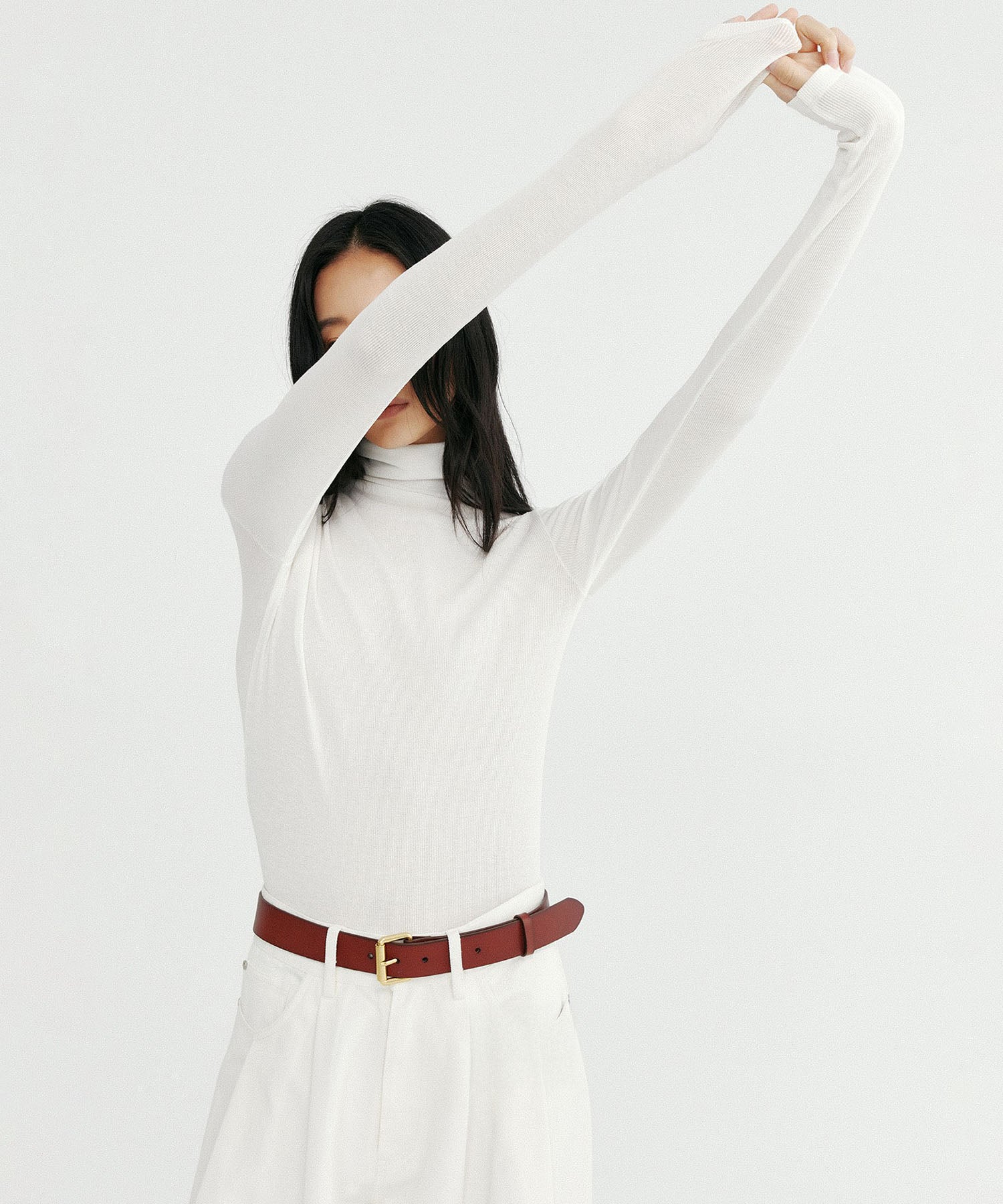 タートルネックリブトップス