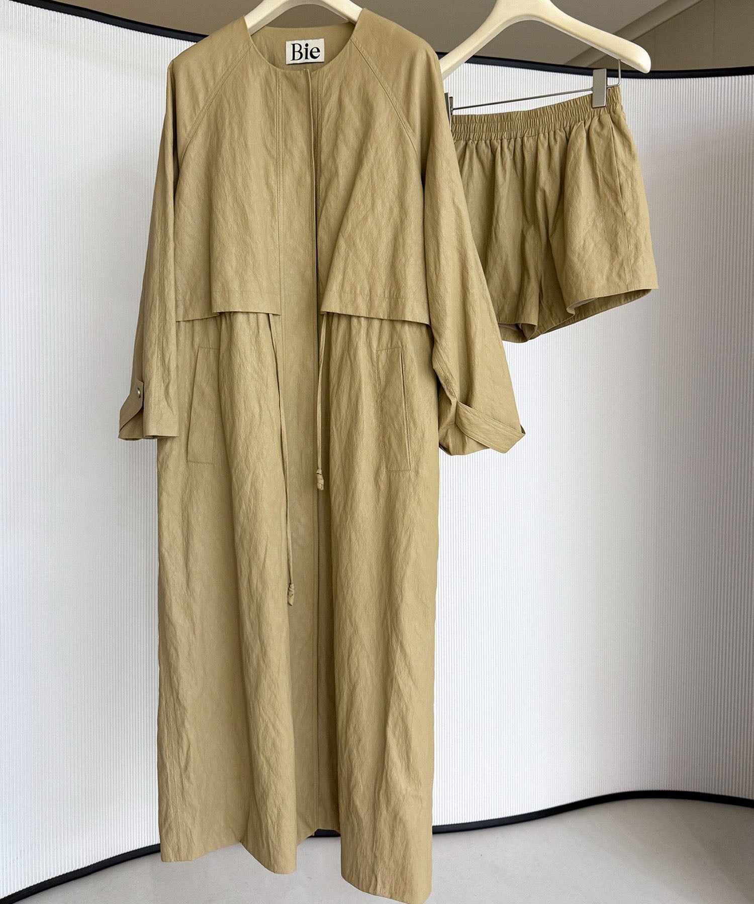 シンセティックレザー ノーカラーロングコート