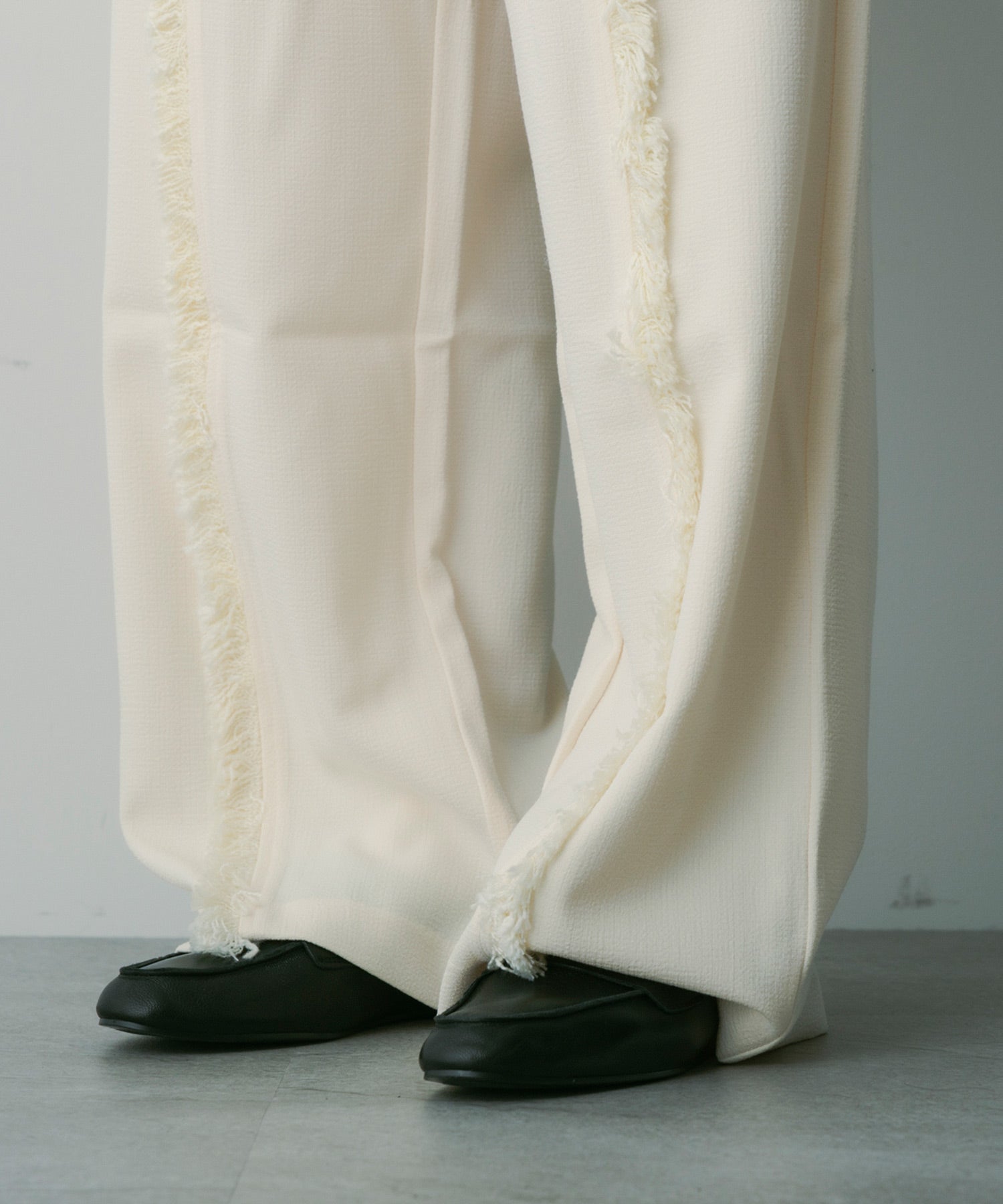 バイカラー フリンジパンツ