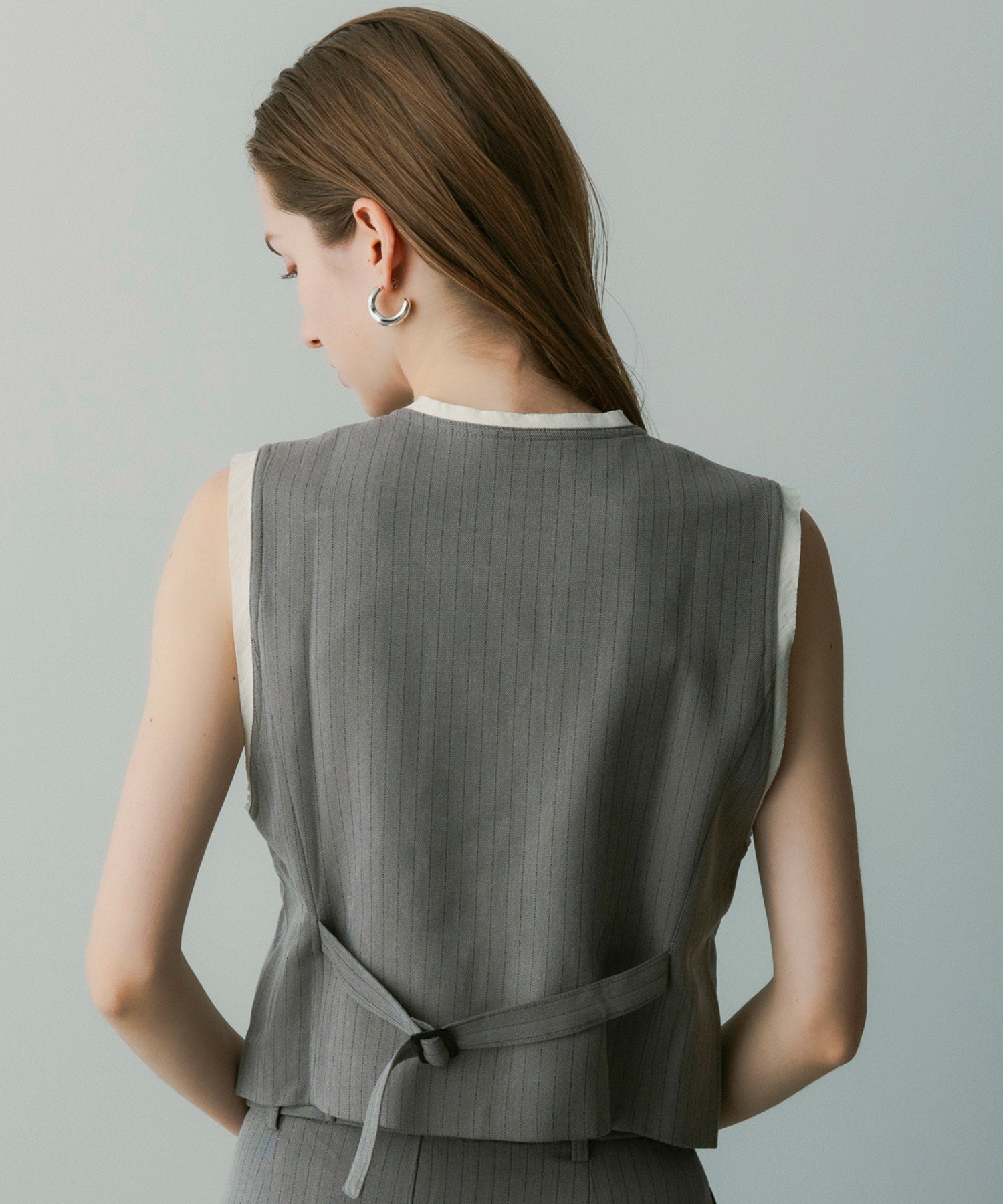 【12月中旬お届け予約商品】ストライプパイピングジレ